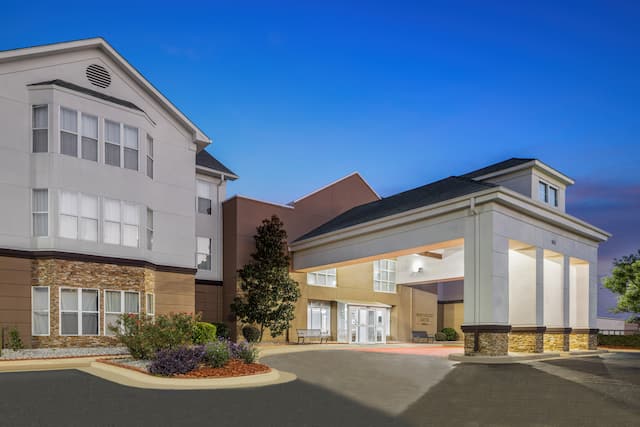 Hotel exterior with entrance and driveway