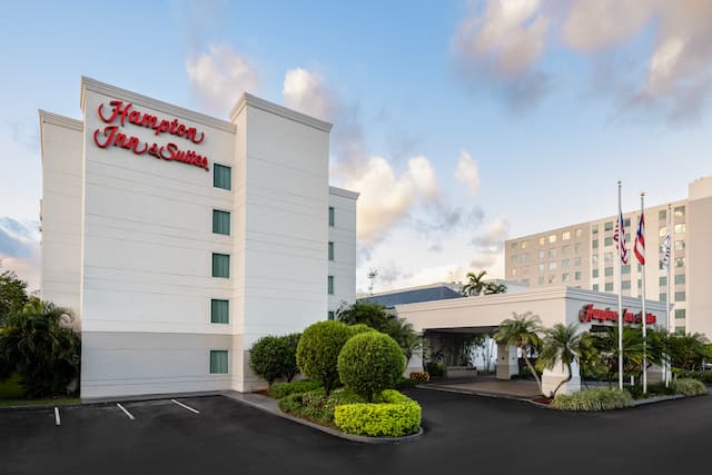 Hampton Inn and Suites Hotel Exterior with Flags