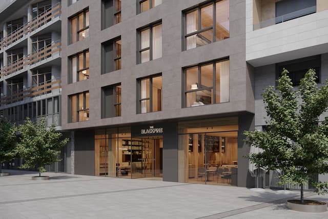 The Blackpine Hotel Exterior Entrance with Trees