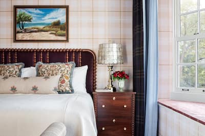 A bedroom with a large window