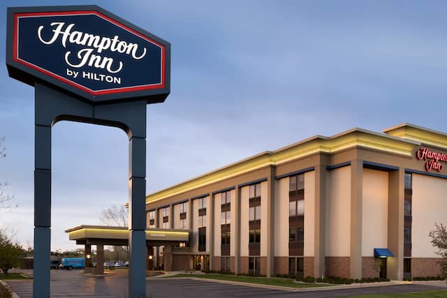 Exterior Evening View with Sign