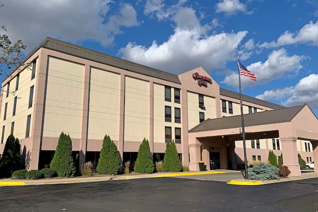 Hotel exterior with flag and entrance