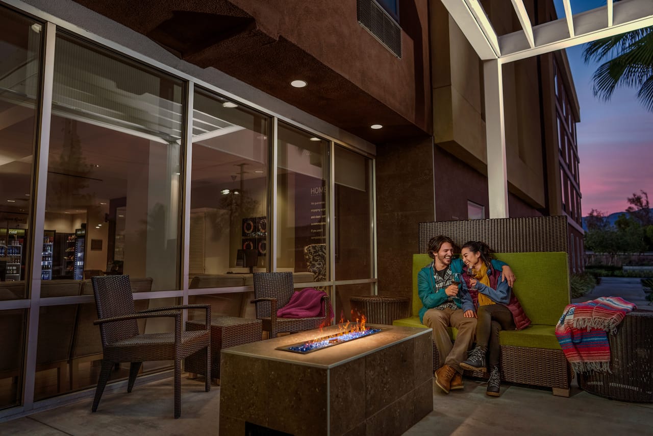 Couple at a fire pit