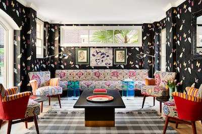 Lobby area with comfortable seating and table