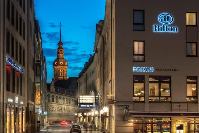 Hotel and Hilton Sign at Dusk