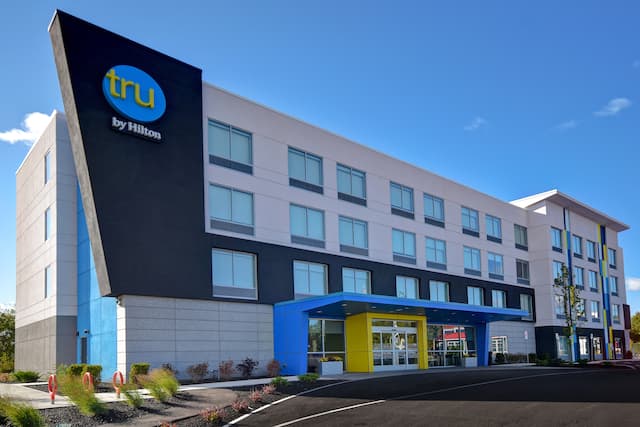 exterior front of hotel in the day