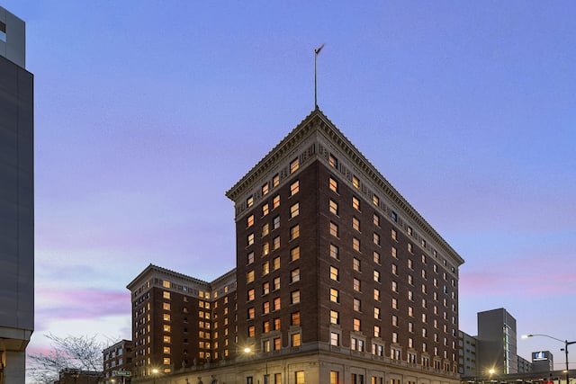 Curio Hotel Exterior in the Evening