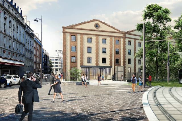 Exterior of hotel with people walking by