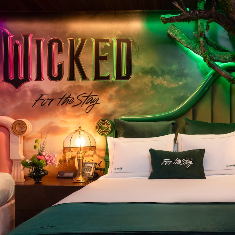 A delightful tribute to the new Wicked film this suite features luxurious green bedding and a sprawling tree inspired by the film.