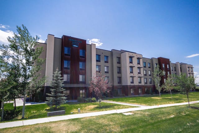 Hotel Exterior and Trees on a Sunny Day