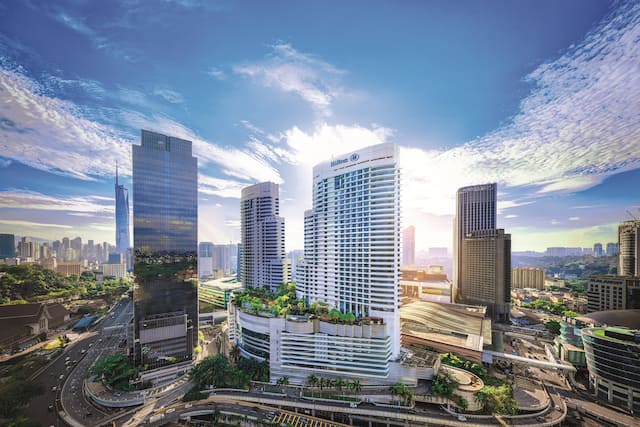 aerial view of hotel exterior and city