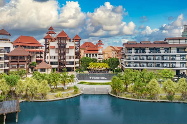 Aerial shot of lake and hotel