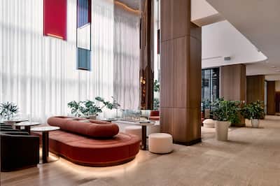 Lobby area with comfortable seating and pillars