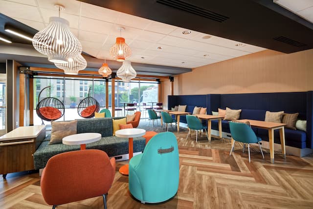 Lobby Seating Area with Chairs, Tables and Sofas