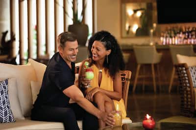 a couple at a lobby bar