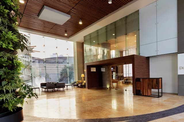 Signage and Soft Seating in Spacious Lobby Area