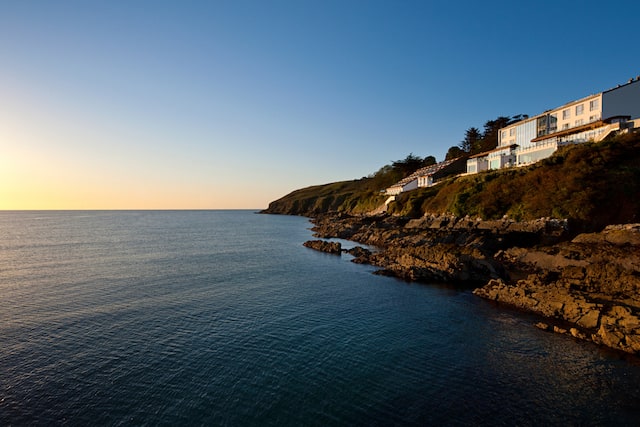 Hotel sitting on clifftop overlooking sea