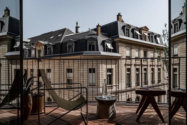 View of Hotel Exterior and Outdoor Sitting Area
