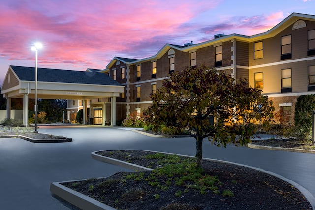 Hampton Inn & Suites Petoskey hotel exterior at dusk