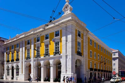 Yellow and white building with blue sky
