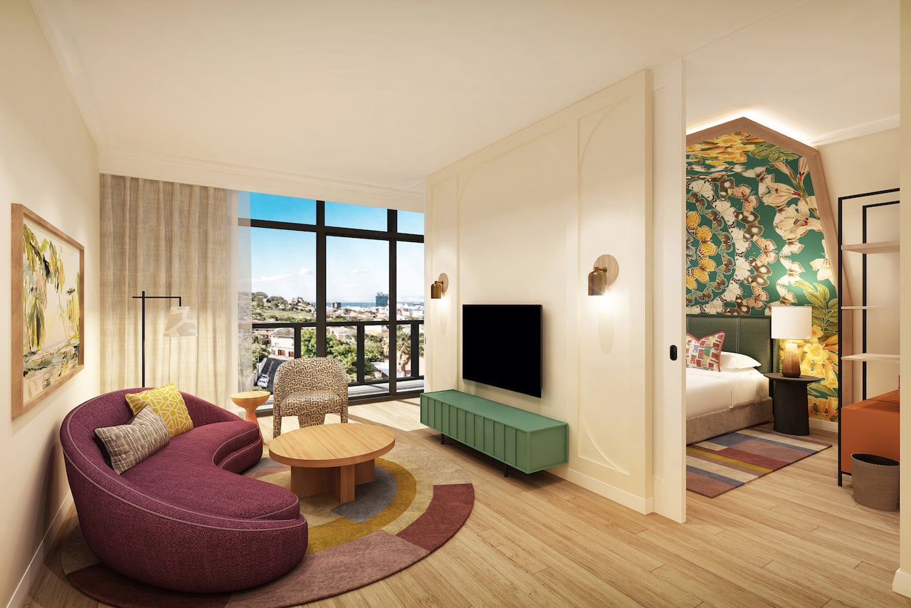 Lounge area with TV, couch and table