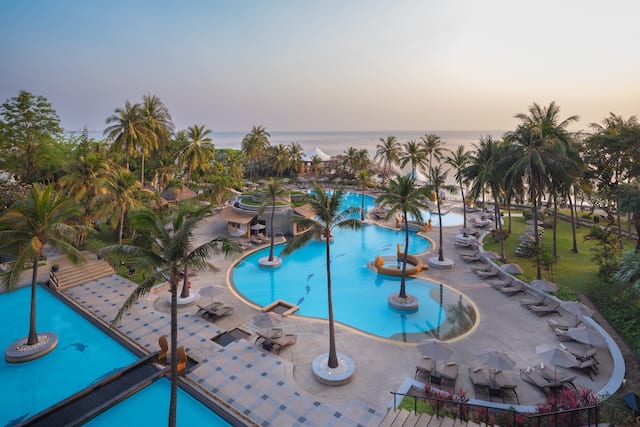 Outdoor pool with loungers