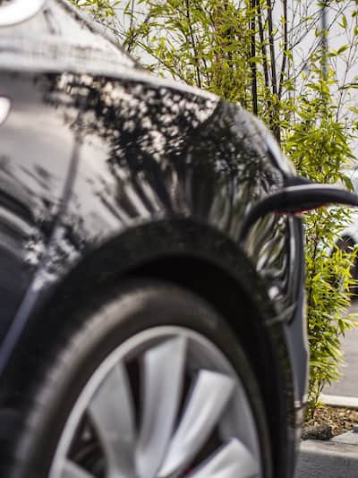 Black car at an Electric Car Charging Station